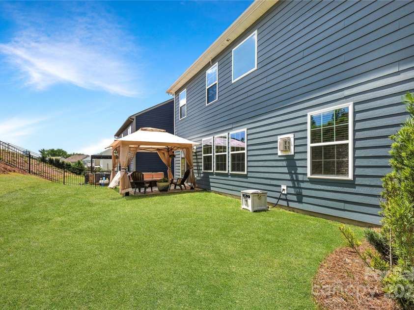 15119 Oleander Drive, Charlotte, NC 28278.  MLS# CAR4272288, YatesRealty ID 34225. Backyard refreshed with new sod and room to entertain