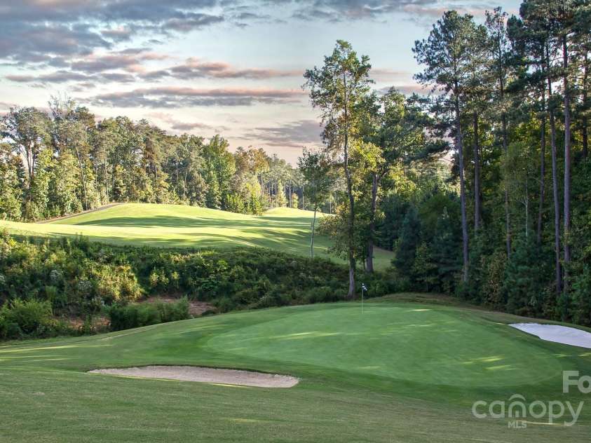 15119 Oleander Drive, Charlotte, NC 28278.  MLS# CAR4272288, YatesRealty ID 34225. Jack Nicklaus-designed Palisades golf course fairway view