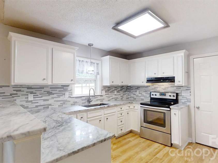 49 Laurel Street, Granite Falls, NC 28630.  MLS# CAR4398926, YatesRealty ID 34228. 