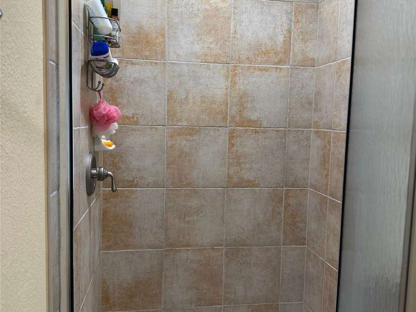 222 Creekside Way, Burnsville, NC 28714.  MLS# CAR4393294, YatesRealty ID 3423. Primary Bath Shower