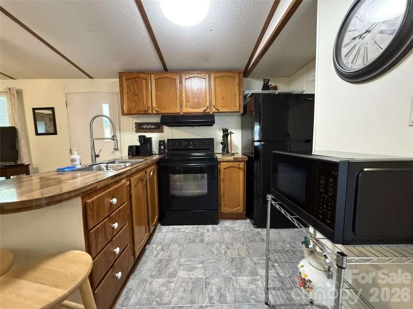 4126 & 4128 Pumpkintown Road, Sylva, NC 28779.  MLS# CAR4399141, YatesRealty ID 34230. 