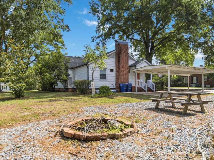 201 Elm Street, Wingate, NC 28174.  MLS# CAR4398796, YatesRealty ID 34232. Firepit