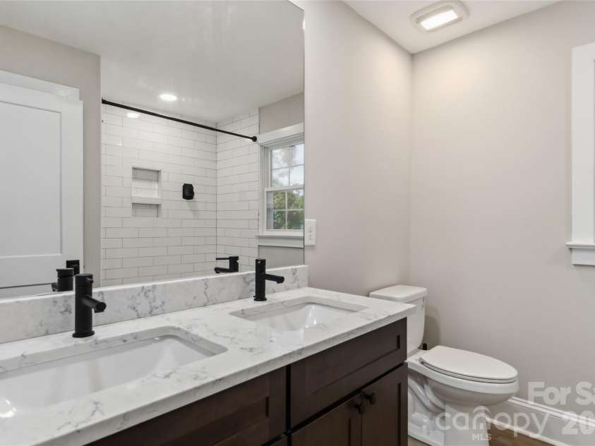201 Elm Street, Wingate, NC 28174.  MLS# CAR4398796, YatesRealty ID 34232. Full bath supporting 2 front Bedrooms