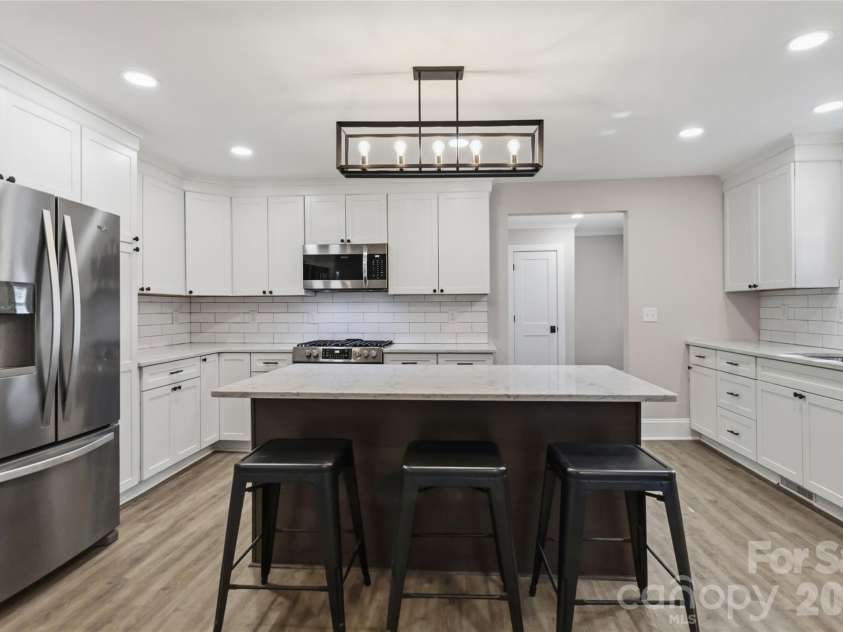 201 Elm Street, Wingate, NC 28174.  MLS# CAR4398796, YatesRealty ID 34232. Kitchen island/ kitchen