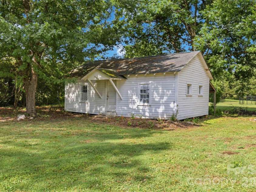 201 Elm Street, Wingate, NC 28174.  MLS# CAR4398796, YatesRealty ID 34232. Outbuilding for storage