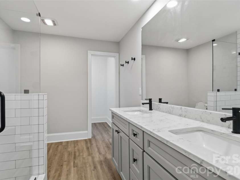 201 Elm Street, Wingate, NC 28174.  MLS# CAR4398796, YatesRealty ID 34232. Primary Bathroom