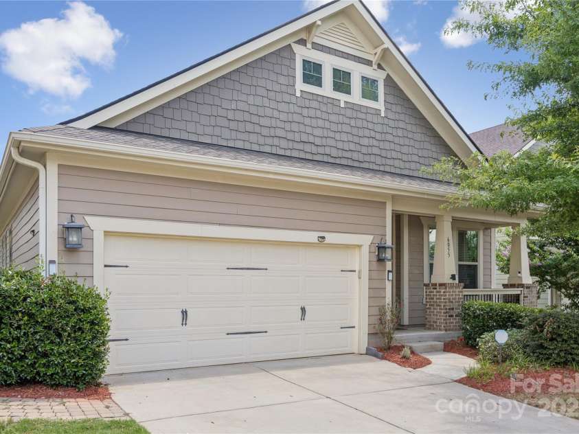 6055 Drave Lane, Fort Mill, SC 29715.  MLS# CAR4283078, YatesRealty ID 34234. 2 Car Garage with lots of shelving