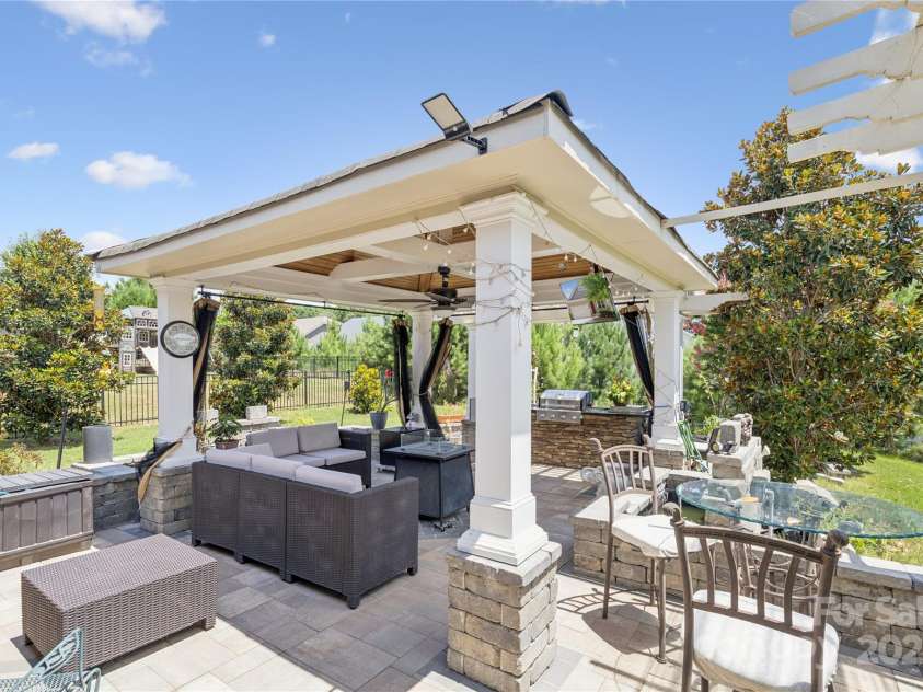 6055 Drave Lane, Fort Mill, SC 29715.  MLS# CAR4283078, YatesRealty ID 34234. Backyard Oasis