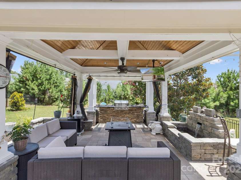 6055 Drave Lane, Fort Mill, SC 29715.  MLS# CAR4283078, YatesRealty ID 34234. Backyard Oasis
