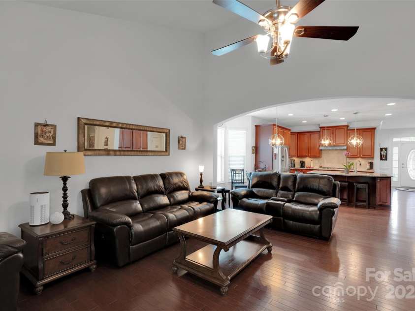 5105 Forest Knoll Court, Indian Trail, NC 28079.  MLS# CAR4282019, YatesRealty ID 34237. Living room area opens to eat in kitchen area and kitchen - great for all types of gatherings