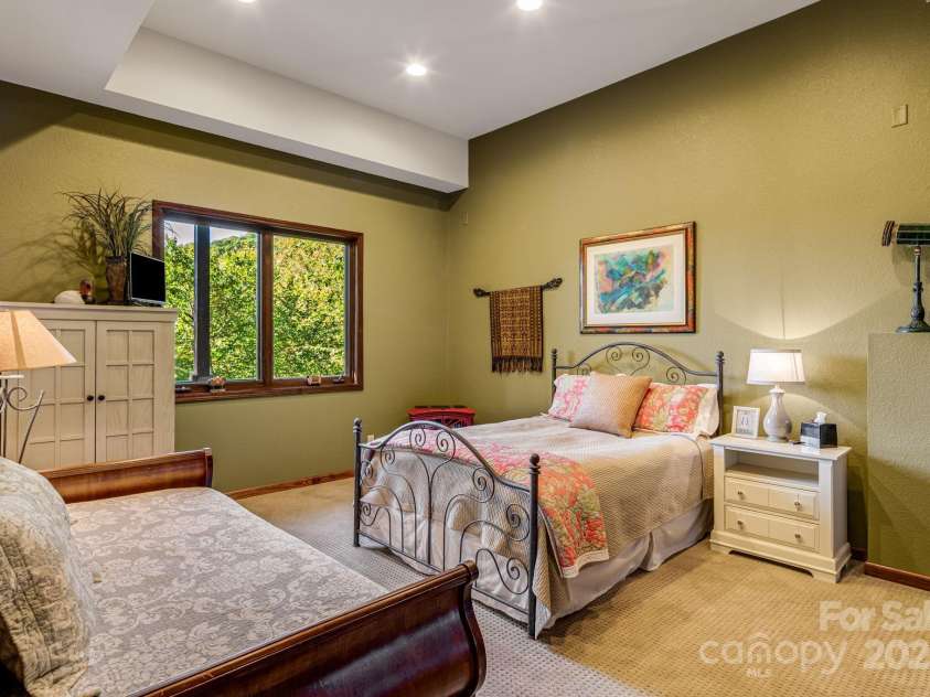 191 Ivy Way, Mars Hill, NC 28754.  MLS# CAR4308782, YatesRealty ID 3424. Bonus room with vented gas fireplace, ensuite full bath. Exterior entrance.