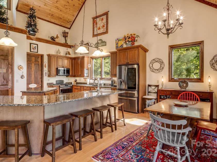 191 Ivy Way, Mars Hill, NC 28754.  MLS# CAR4308782, YatesRealty ID 3424. Dining area and kitchen.