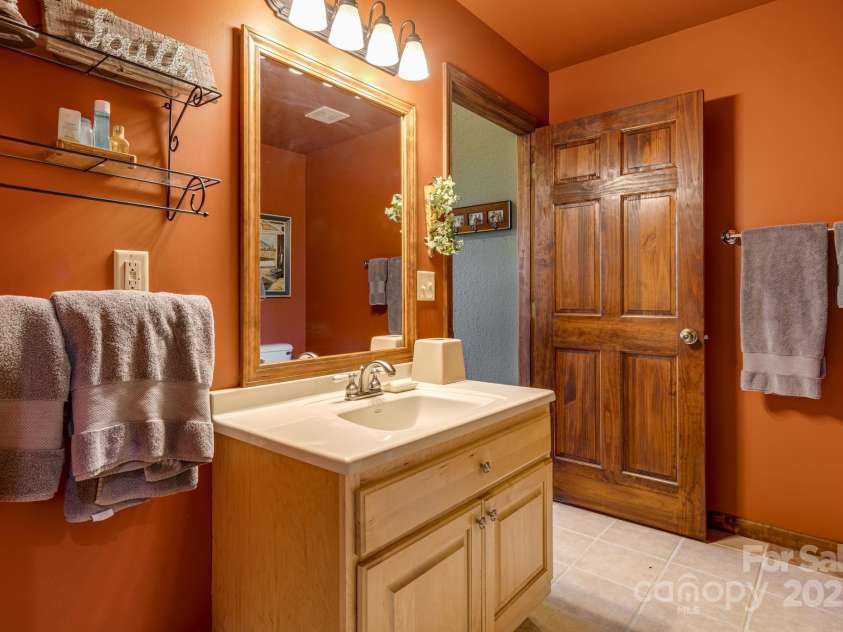 191 Ivy Way, Mars Hill, NC 28754.  MLS# CAR4308782, YatesRealty ID 3424. Full bath on the lower level.