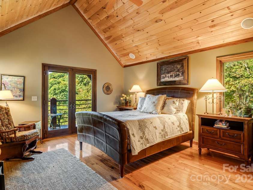 191 Ivy Way, Mars Hill, NC 28754.  MLS# CAR4308782, YatesRealty ID 3424. Upper level guest room with private balcony overlooking the mountains.