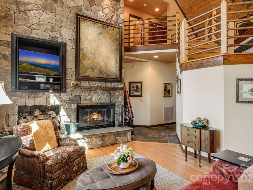 191 Ivy Way, Mars Hill, NC 28754.  MLS# CAR4308782, YatesRealty ID 3424. Wood burning fireplace for chilly evenings.