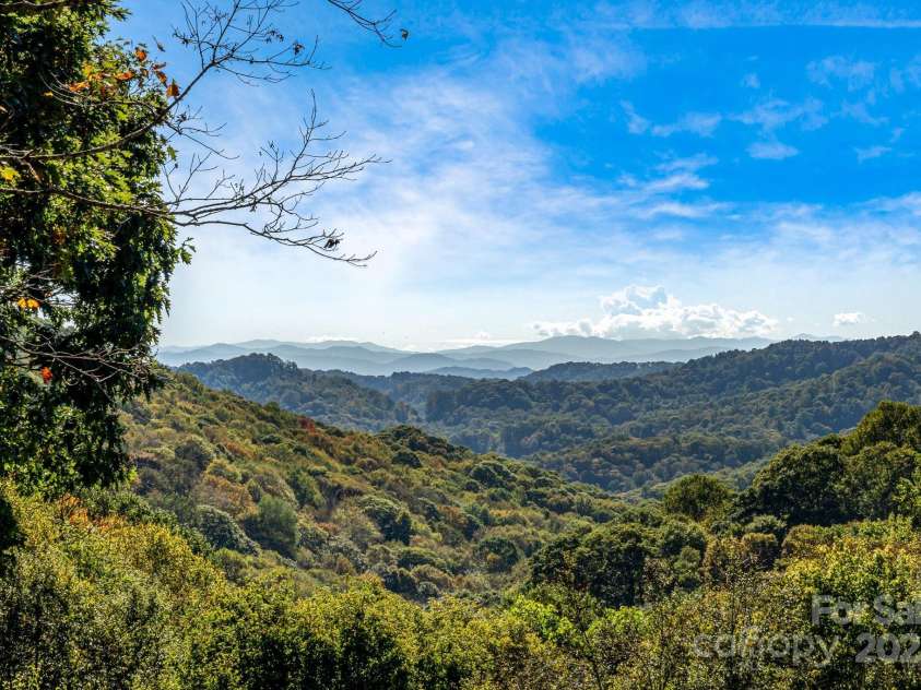 191 Ivy Way, Mars Hill, NC 28754.  MLS# CAR4308782, YatesRealty ID 3424. Year round views from the deck.