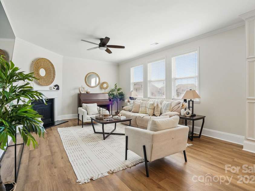 7635 Carrington Forest Lane, Matthews, NC 28105.  MLS# CAR4239500, YatesRealty ID 3424. Gorgeous Living Room with Gas Fireplace