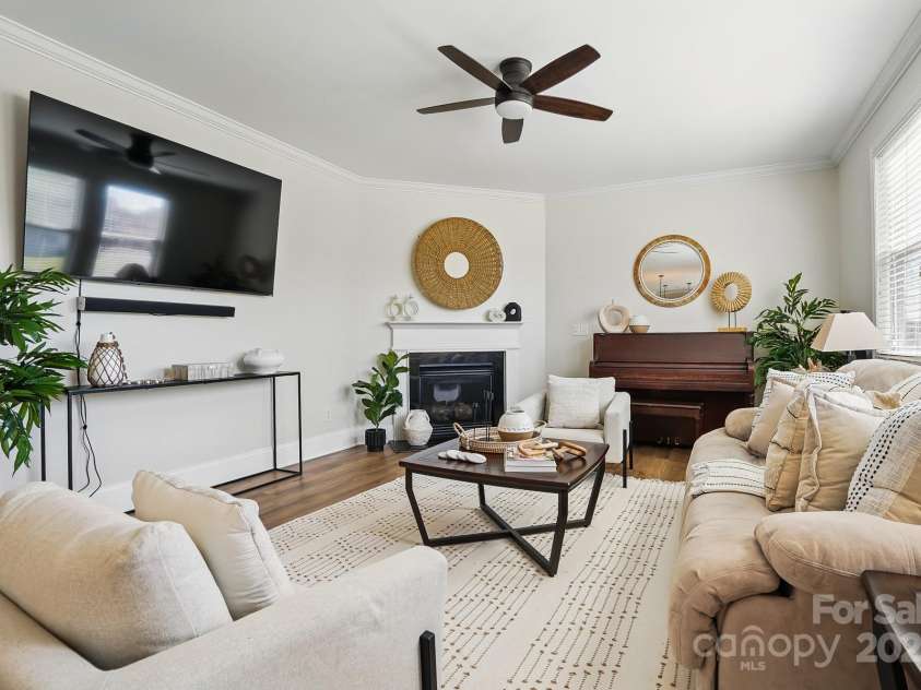 7635 Carrington Forest Lane, Matthews, NC 28105.  MLS# CAR4239500, YatesRealty ID 3424. Gorgeous Living Room with Gas Fireplace