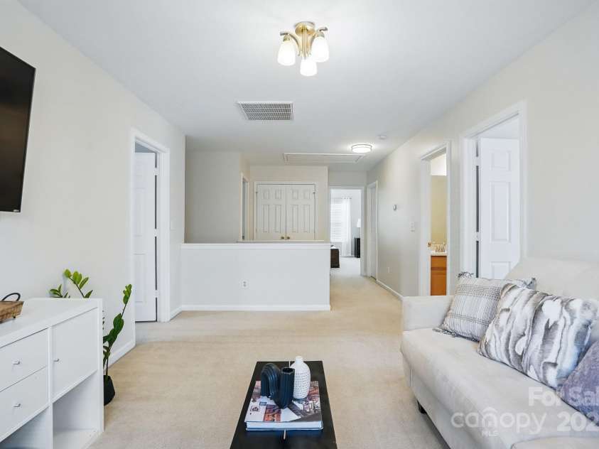 7635 Carrington Forest Lane, Matthews, NC 28105.  MLS# CAR4239500, YatesRealty ID 3424. Large Loft Space with tons of Room for 2nd Living Room, Game Room, Play Room or Hobby Area