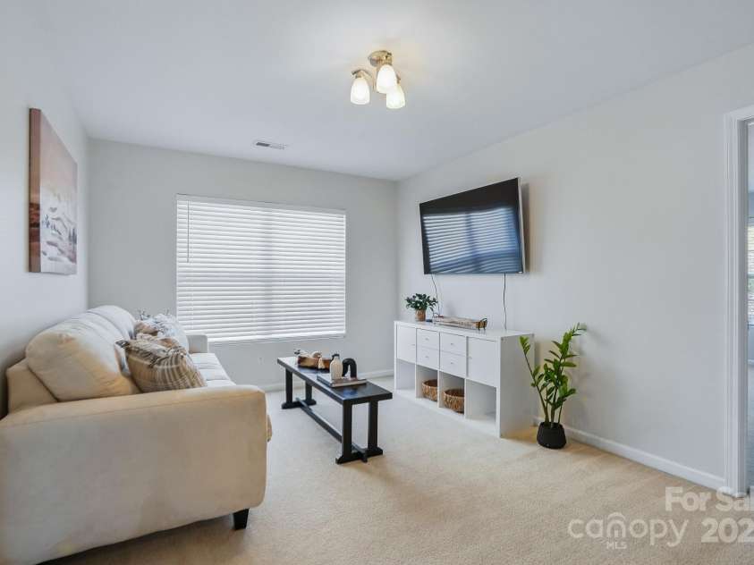 7635 Carrington Forest Lane, Matthews, NC 28105.  MLS# CAR4239500, YatesRealty ID 3424. Large Loft Space with tons of Room for 2nd Living Room, Game Room, Play Room or Hobby Area