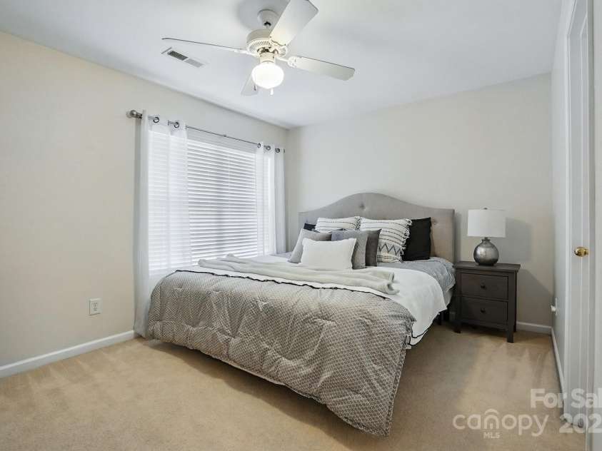 7635 Carrington Forest Lane, Matthews, NC 28105.  MLS# CAR4239500, YatesRealty ID 3424. Secondary Bedroom 2. Generous Closet Size.