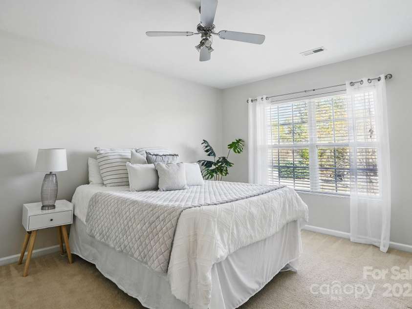 7635 Carrington Forest Lane, Matthews, NC 28105.  MLS# CAR4239500, YatesRealty ID 3424. Secondary Bedroom 3. Generous Closet Size.
