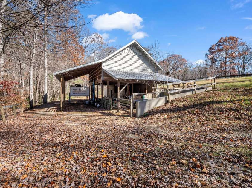 765 Higher Path, Saluda, NC 28773.  MLS# CAR4326175, YatesRealty ID 3425. Barn with drive thru trailer parking