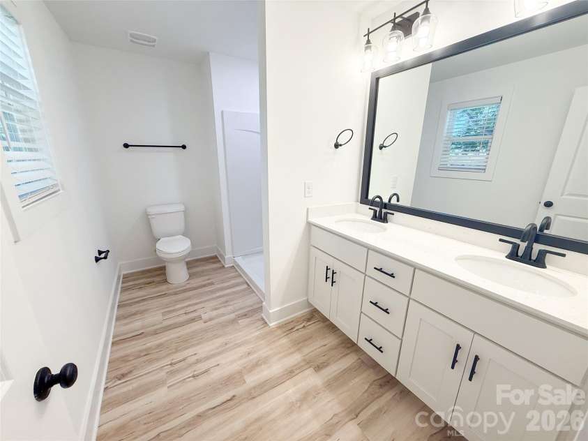 201 Rice Street, Landis, NC 28088.  MLS# CAR4399384, YatesRealty ID 34251. Primary bathroom