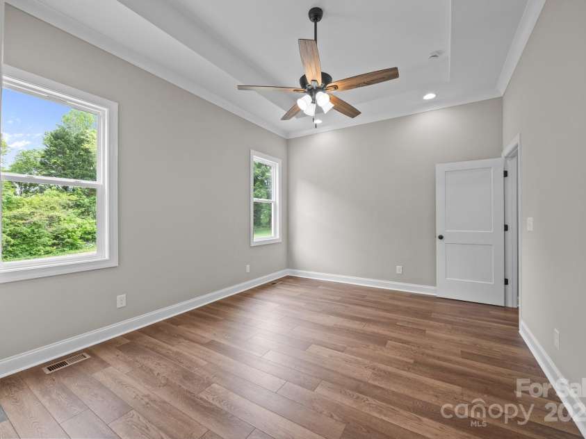 5037 Faith Road, Salisbury, NC 28146.  MLS# CAR4204735, YatesRealty ID 34251. Additional View of the primary bedroom