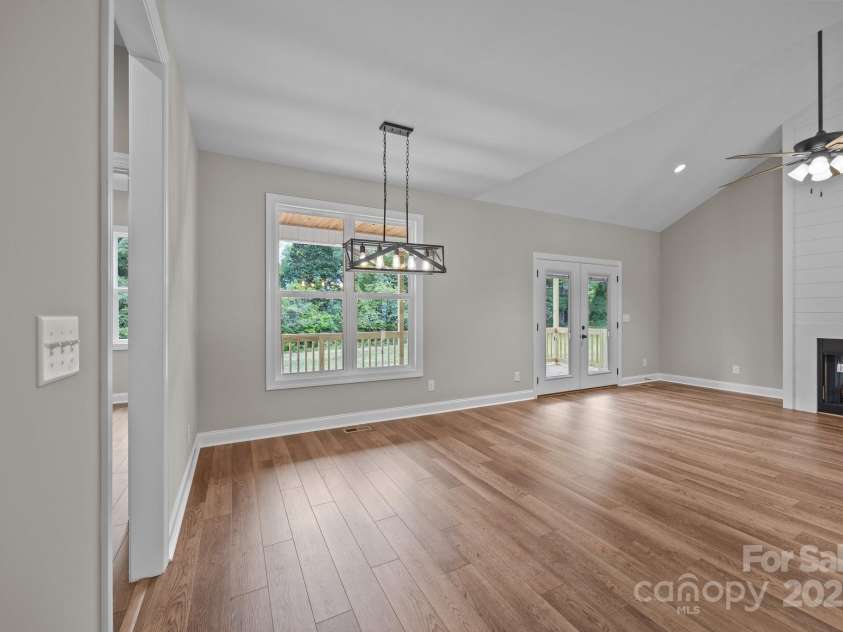 5037 Faith Road, Salisbury, NC 28146.  MLS# CAR4204735, YatesRealty ID 34251. Dining area- over looking HUGE FLAT back yard