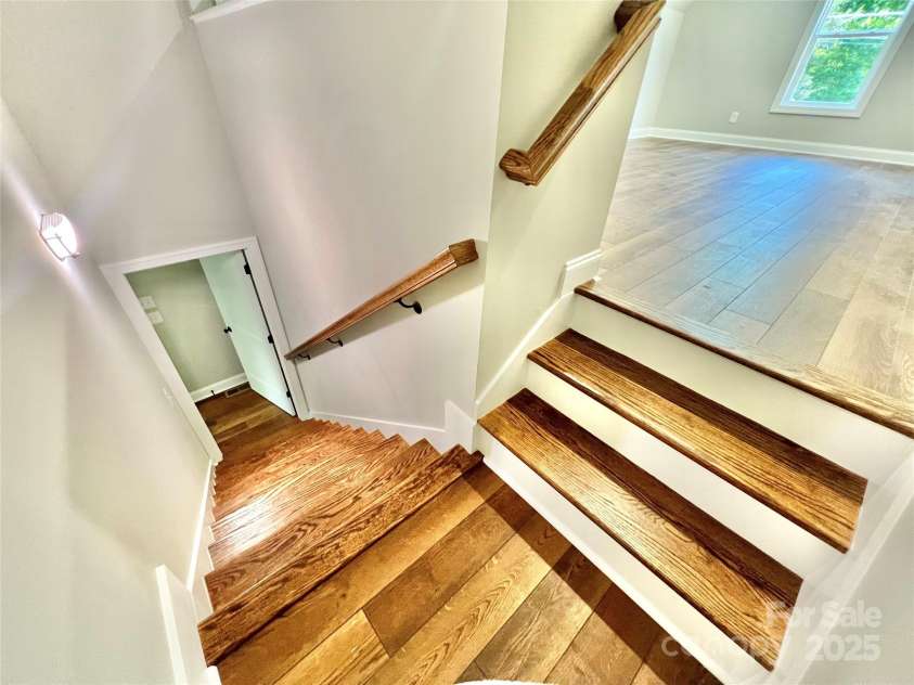 5037 Faith Road, Salisbury, NC 28146.  MLS# CAR4204735, YatesRealty ID 34251. Steps leading to the bonus room