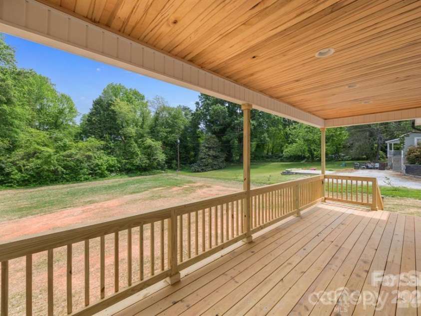 5037 Faith Road, Salisbury, NC 28146.  MLS# CAR4332559, YatesRealty ID 34251. Covered Rear porch