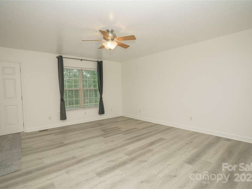 2404 Sides Road, Rockwell, NC 28138.  MLS# CAR4288806, YatesRealty ID 34254. Great room 2