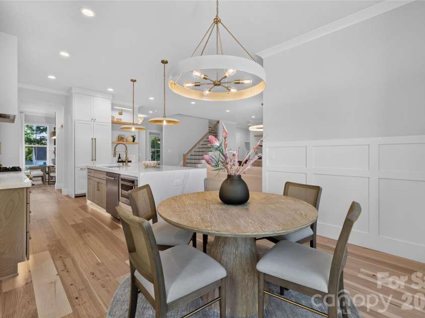 3119 Shenandoah Avenue, Charlotte, NC 28205.  MLS# CAR4394625, YatesRealty ID 34254. Breakfast area with wainscoting, crown molding, bespoken lighting 