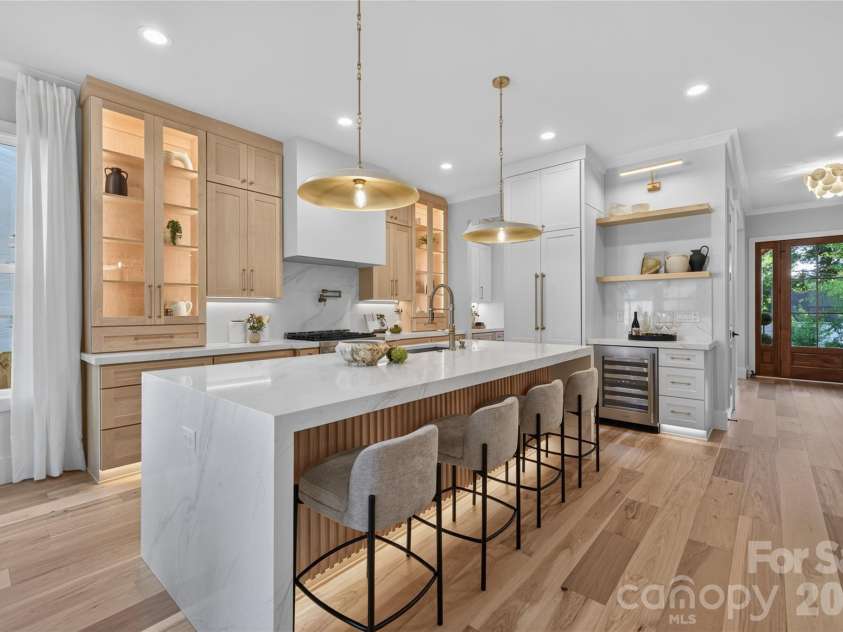 3119 Shenandoah Avenue, Charlotte, NC 28205.  MLS# CAR4394625, YatesRealty ID 34254. Gourmet kitchen with all the bells and whistles! Interior cabinet lighting, dimmable toe kick & under cabinet lighting, panel ready refrigerator, beautifully appointed maple & off white two toned cabinetry, 2.5