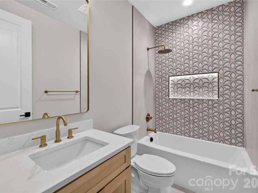 3119 Shenandoah Avenue, Charlotte, NC 28205.  MLS# CAR4394625, YatesRealty ID 34254. Hall bath with yes, another illuminated shower niche!