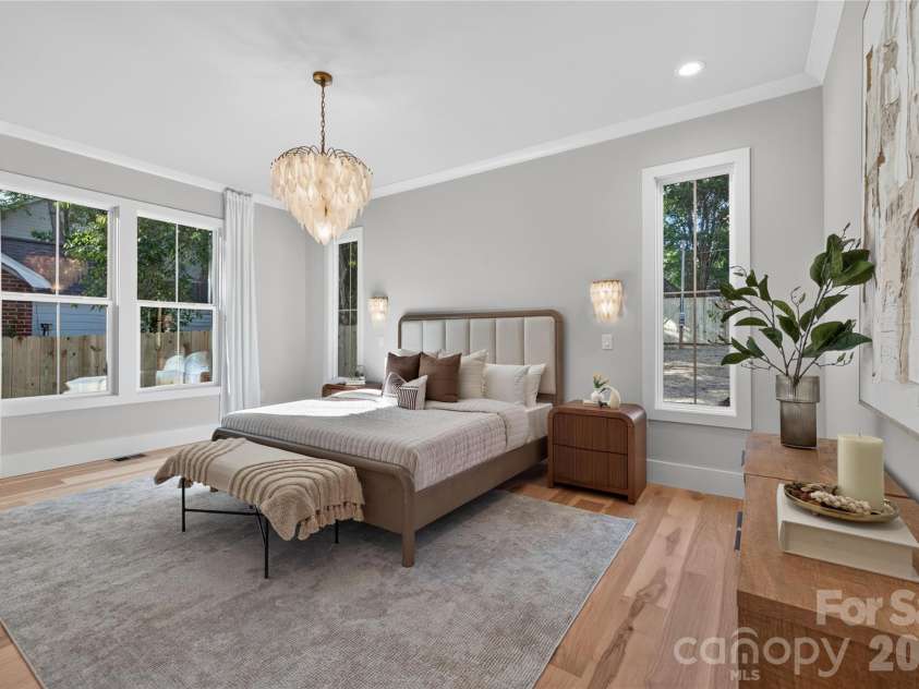 3119 Shenandoah Avenue, Charlotte, NC 28205.  MLS# CAR4394625, YatesRealty ID 34254. Primary suite with and matching sconces striking bespoken light fixture with matching sconces, recessed lighting.