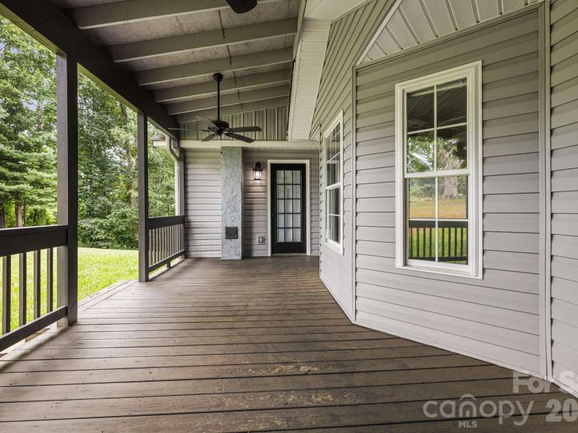 40 Brierfield Drive, Candler, NC 28715.  MLS# CAR4402345, YatesRealty ID 34256. Back deck