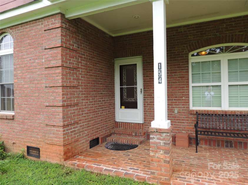 154 Edley Toney Road, Ellenboro, NC 28040.  MLS# CAR4292009, YatesRealty ID 34261. Front Porch Detail