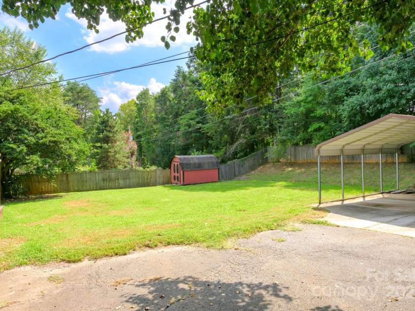 9012 McMillian Drive, Harrisburg, NC 28075.  MLS# CAR4295135, YatesRealty ID 34264. Backyard
