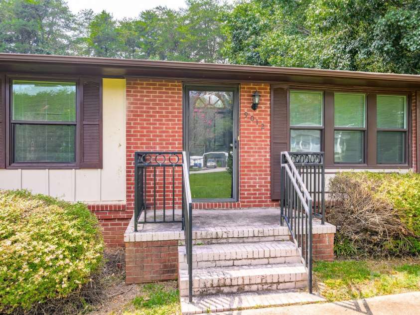 9012 McMillian Drive, Harrisburg, NC 28075.  MLS# CAR4295135, YatesRealty ID 34264. Front porch