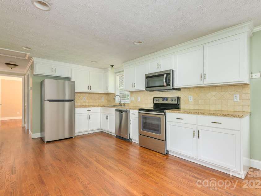 9012 McMillian Drive, Harrisburg, NC 28075.  MLS# CAR4295135, YatesRealty ID 34264. Kitchen