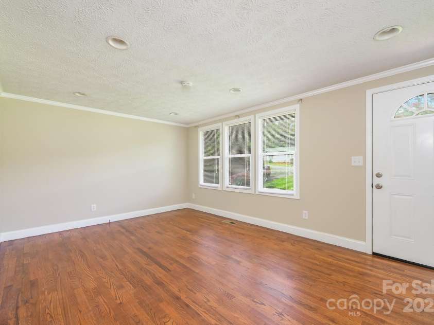 9012 McMillian Drive, Harrisburg, NC 28075.  MLS# CAR4295135, YatesRealty ID 34264. Living room