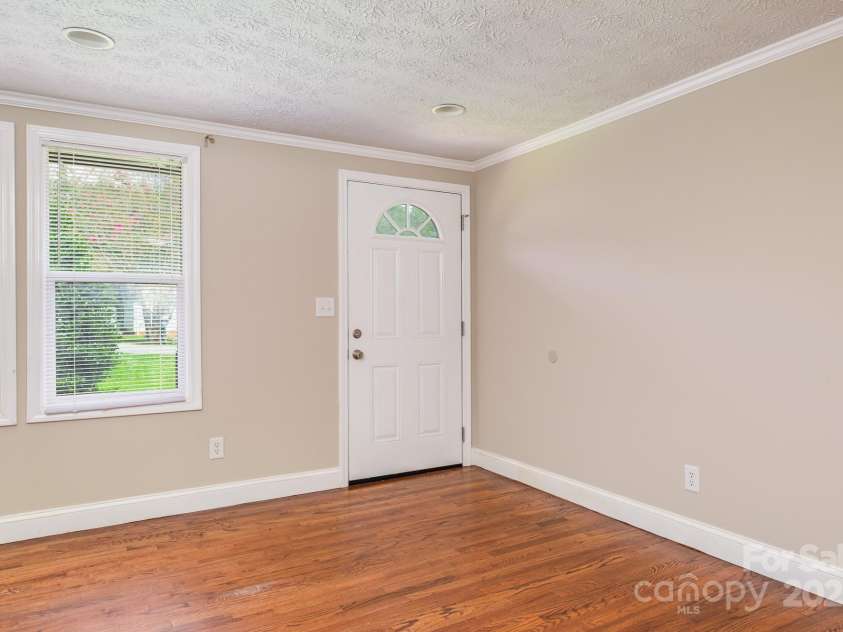 9012 McMillian Drive, Harrisburg, NC 28075.  MLS# CAR4295135, YatesRealty ID 34264. Living room