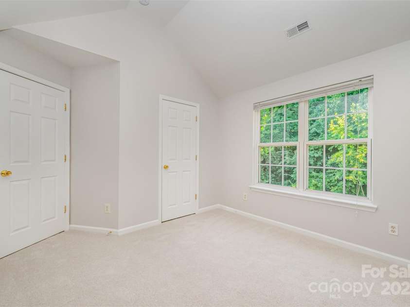 4317 Springhaven Drive, Charlotte, NC 28269.  MLS# CAR4270772, YatesRealty ID 34266. Upstairs Bedroom 2
