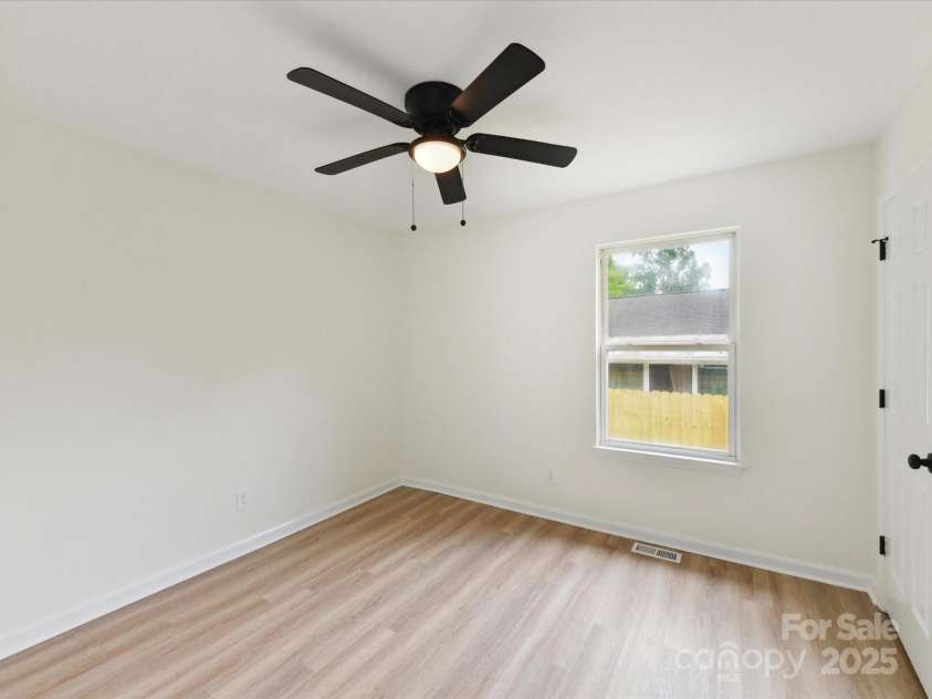 2017 Brewton Drive, Charlotte, NC 28206.  MLS# CAR4265702, YatesRealty ID 34269. 2nd bedroom - all bedrooms have ceiling fans!