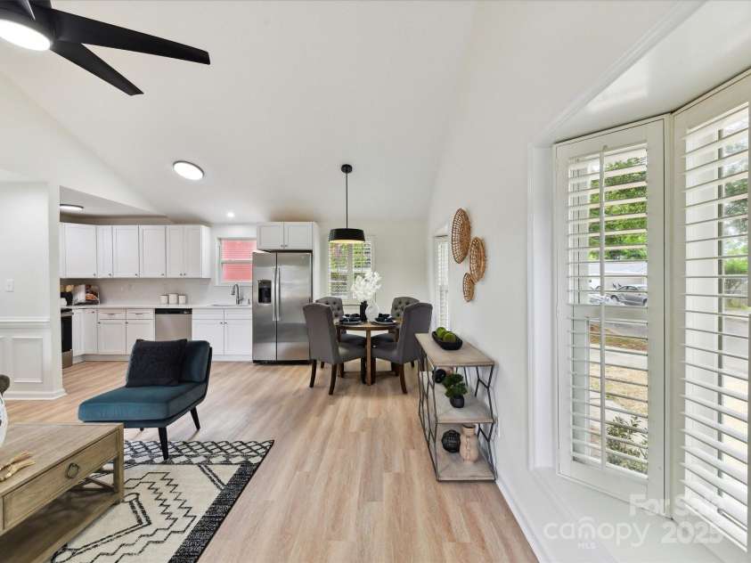 2017 Brewton Drive, Charlotte, NC 28206.  MLS# CAR4265702, YatesRealty ID 34269. Beautiful plantation shutters on two bay windows in den