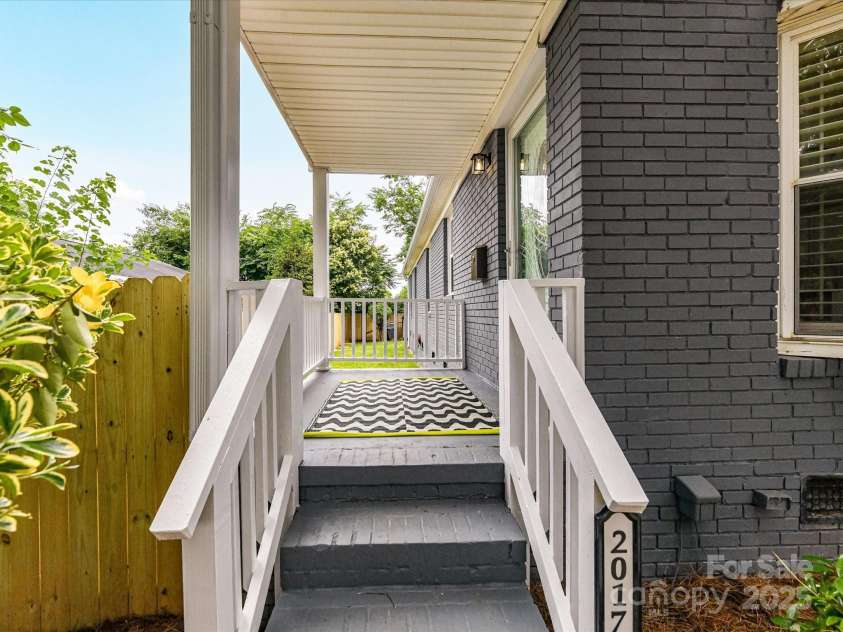 2017 Brewton Drive, Charlotte, NC 28206.  MLS# CAR4265702, YatesRealty ID 34269. Darling side covered front porch