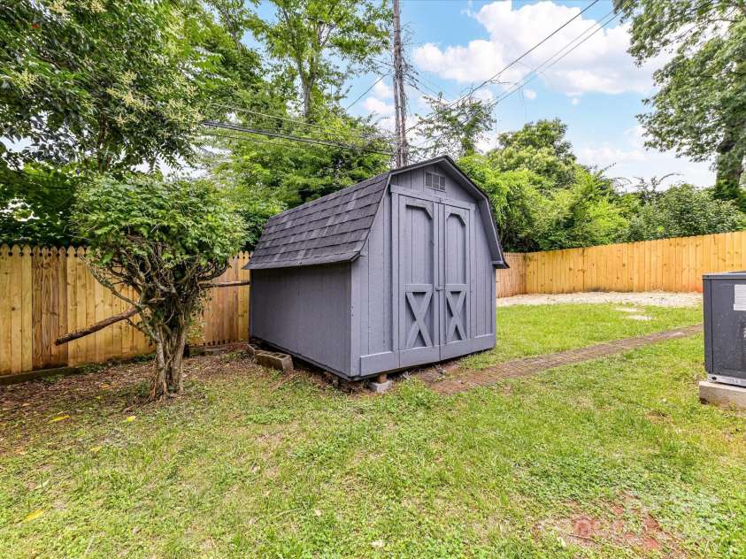 2017 Brewton Drive, Charlotte, NC 28206.  MLS# CAR4265702, YatesRealty ID 34269. Outdoor shed for extra storage