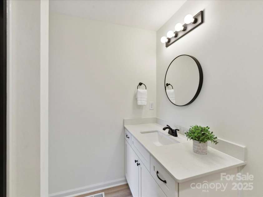 2017 Brewton Drive, Charlotte, NC 28206.  MLS# CAR4265702, YatesRealty ID 34269. Primary bath